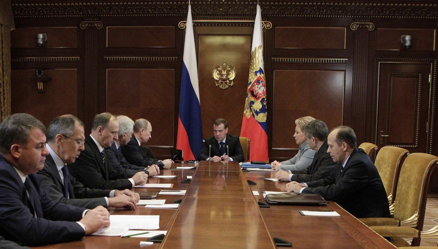 Russian President Dmitry Medvedev (center) chairs a Security Council meeting in the Gorki residence outside Moscow on Nov. 23, 2011. From left is Defense Minister Anatoly Serdyukov, Foreign Minister Sergey Lavrov, Security Council Secretary Nikolai Patrushev, Duma Speaker Boris Gryzlov and Prime Minister Vladimir Putin. (Associated Press/RIA Novosti, Mikhail Klimentyev, Presidential Press Service)