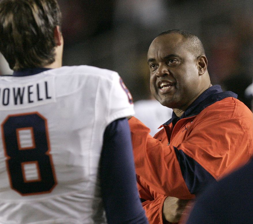 Coach Mike London's Virginia Cavaliers have the chance rebound in a big way from last season's last-place finish. It starts with a win against in-state rival Virginia Tech on Saturday. (AP Photo/Steve Cannon)
