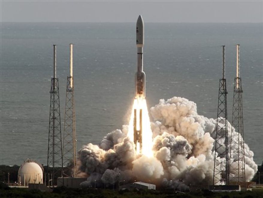 A United Launch Alliance Atlas V rocket carrying NASA's Mars Science Laboratory (MSL) Curiosity rover lifts off from Launch Complex 41 at Cape Canaveral Air Force Station in Cape Canaveral, Fla., Saturday, Nov. 26, 2011. The rocket will deliver a science laboratory to Mars to study potential habitable environments on the planet. (AP Photo/Terry Renna)