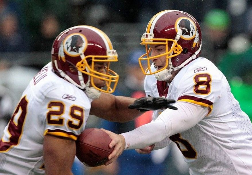 Redskins running back Roy Helu (29) took 23 handoffs from quarterback Rex Grossman on Sunday, rushing for 108 yards against a stingy Seattle defense. His previous career high for carries was 10. (Associated Press)