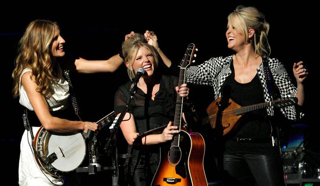 The Dixie Chicks&#x27; VH1 &quot;Storytellers&quot; 2006 segment is newly available on DVD. Here the Chicks, Emily Robison, Natalie Maines and Martie Maguire, perform in 2007. (Associated Press)

