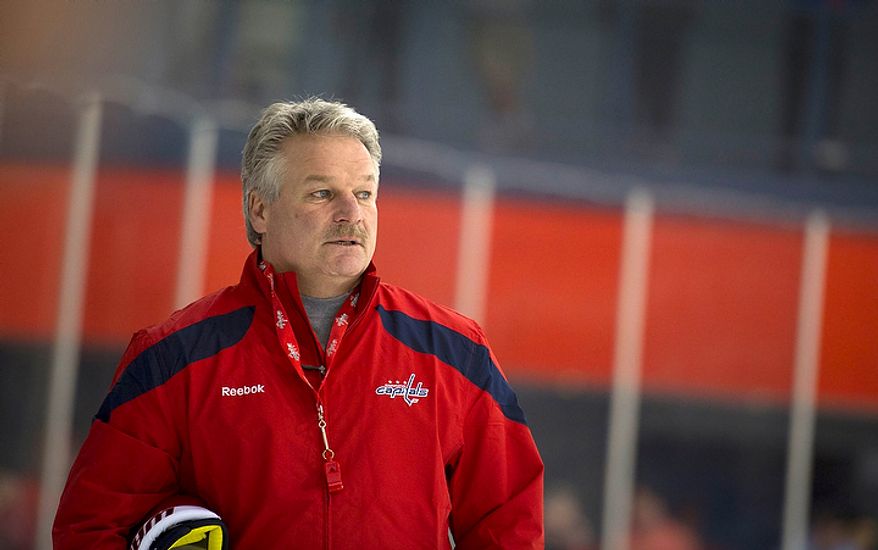 New Washington Capitals Head Coach Dale Hunter takes to the ice with his team as they practice together for the first time, at the Kettler Capitals Iceplex in Arlington, Va, Monday, November 28, 2011. (Rod Lamkey Jr/ The Washington Times)