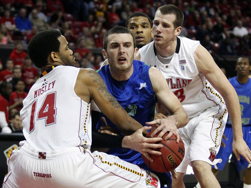 Maryland forward John Auslander (right): "I thought I could eventually earn some time. I never envisioned 20 minutes. It's a great opportunity and I just want to keep working and getting better." (AP Photo/Patrick Semansky)