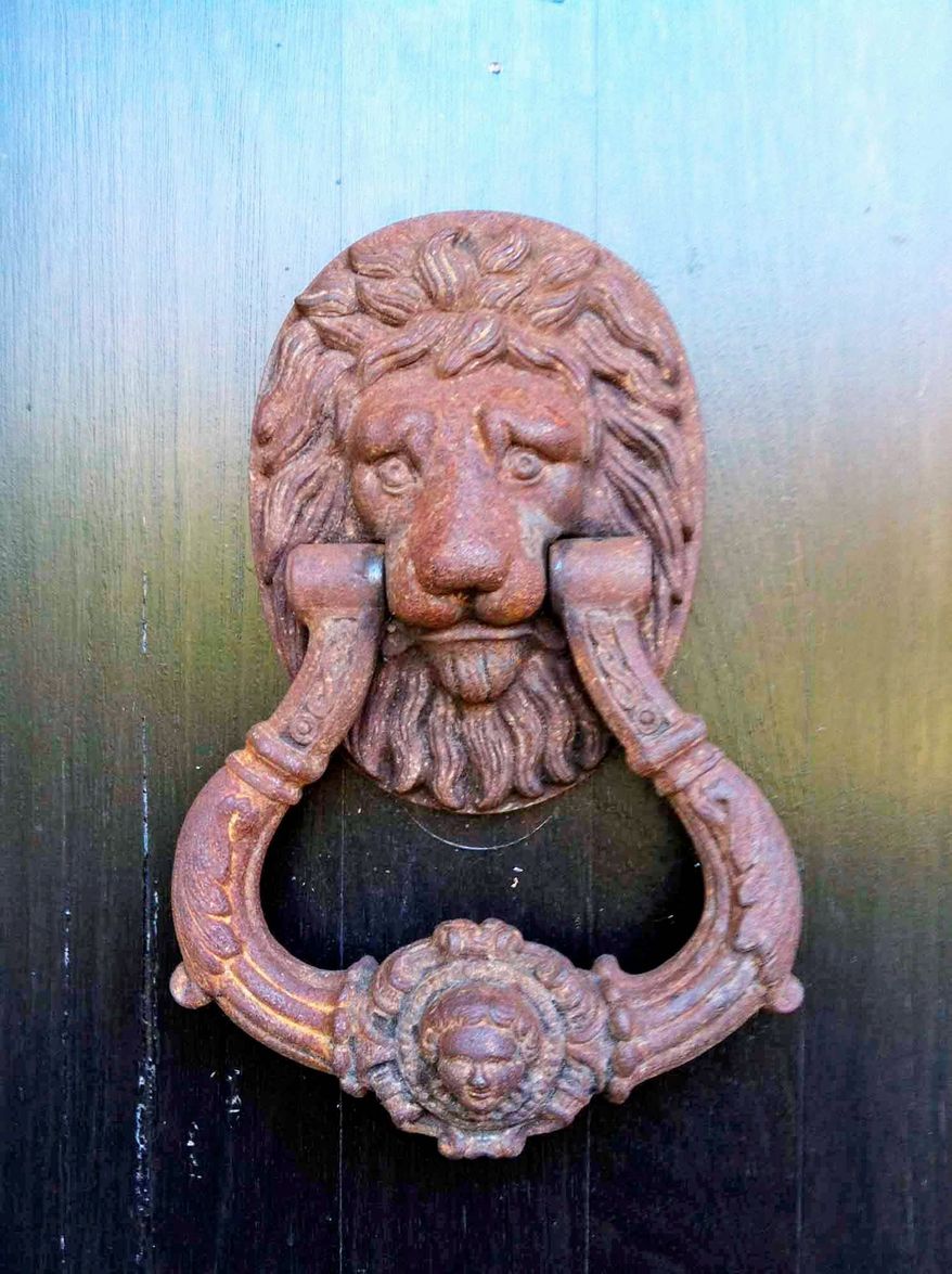 Jeff Akseizer with McLean's Akseizer Design Group suggests using a distinctive door knocker or an urn to give a home somestylish curb appeal.
