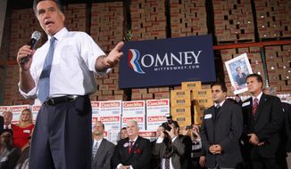 Republican presidential candidate Mitt Romney stumps in Florida. He has dramatically boosted his campaigning in Iowa with just a month to go before caucuses there. (Associated Press)