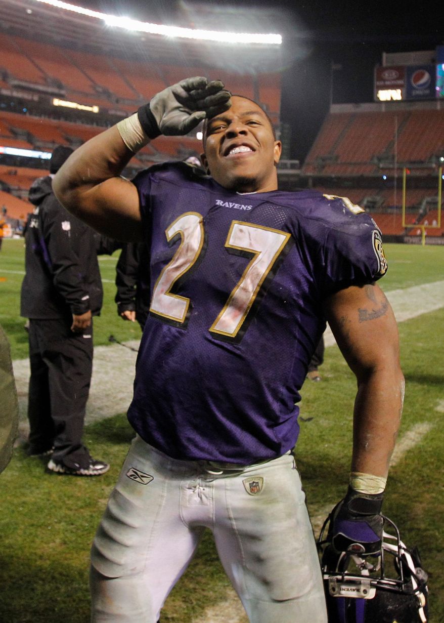 Ravens running back Ray Rice salutes fans as he leaves the stadium Sunday. Rice gained 204 yards in Baltimore's victory over AFC North rival Cleveland. (Associated Press)