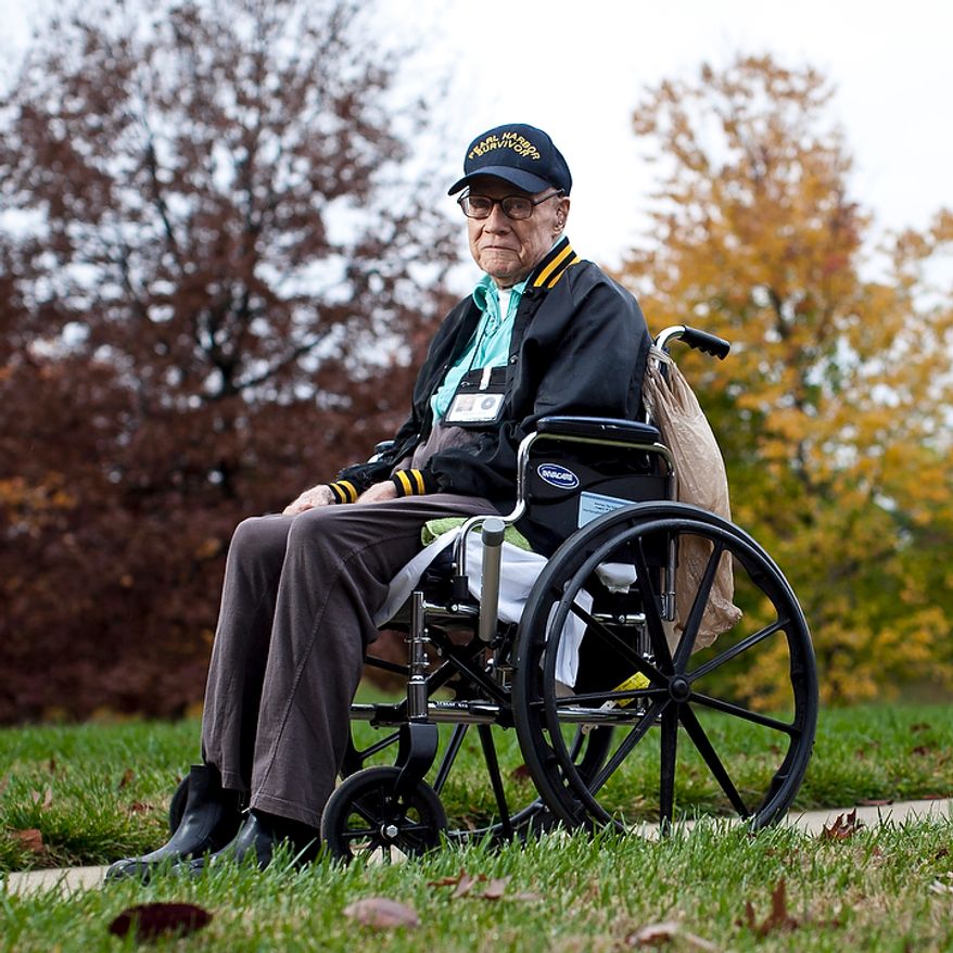 Edward Davis, 90, enlisted in the Army at 17 and was stationed at Schofield Barracks on Oahu during the attack on Pearl Harbor. Davis spent much of his life in the Army, working up to 1st Sergeant through service in the South Pacific during WWII, in Germany and Korea during the Korean War, and on three tours of Vietnam in the late 1960s. Davis was diagnosed with post traumatic stress disorder after his WWII service, then known as "shell-shock", and now battles with Parkinson's disease that he says is the result of Agent Orange exposure during his time in Vietnam. Davis lives at the Armed Forces Retirement Home in Washington, D.C., seen on Nov. 17, 2011. (T.J. Kirkpatrick/ The Washington Times)