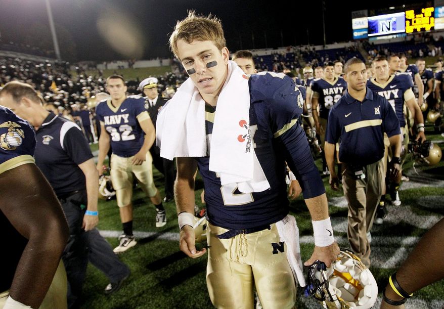 Quarterback Kriss Proctor and his Navy teammates lost five games this season by a combined 11 points. The Midshipmen will look to beat Army for the 10th consecutive time when the service academies meet Saturday at FedEx Field. (Associated Press)