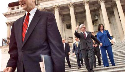 ** FILE ** Rep. Bob Livingston (left), followed by outgoing House Speaker Newt Gingrich and his wife, Marianne, walks down the steps of the Capitol in Washington on Wednesday, Nov. 18, 1998. The men were going to a meeting at which Republicans were to choose their leadership for the 106th Congress. (AP Photo/Pablo Martinez Monsivais, File)
