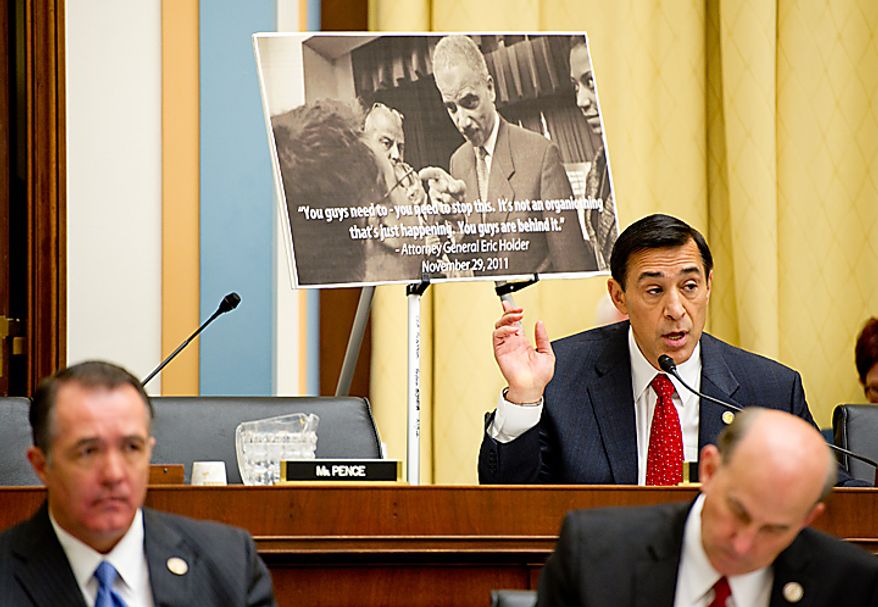 Rep. Darrell Issa points to a poster depicting Attorney General Eric H. Holder Jr. as the lawmaker makes his opening statement during Mr. Holder&#x27;s appearance before the House Judiciary Committee on Thursday, Dec. 8, 2011. (Andrew Harnik/The Washington Times)