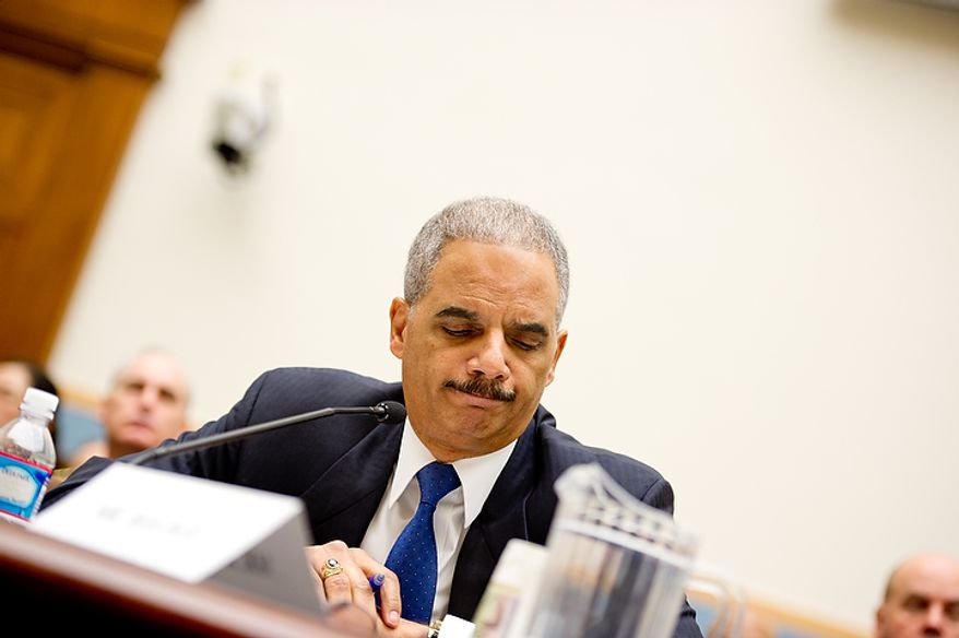 U.S. Attorney General Eric Holder shows his frustration while giving testimony before the House Judiciary Committee concerning &quot;Fast and Furious&quot; a federal gun sting which allowed weapons to go to Mexican drug cartels through straw buyers, Thursday, December 8, 2011. (Andrew Harnik / The Washington Times)