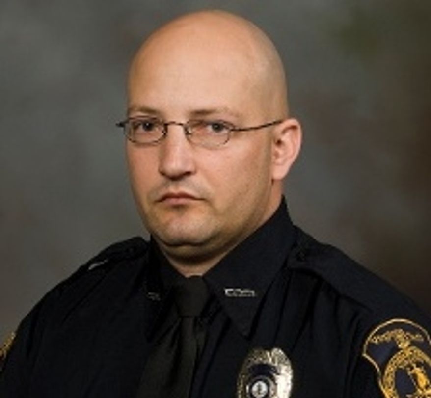 Virginia Tech police Officer Deriek Crouse was shot and killed on Thursday, Dec. 8, 2011, during a routine traffic stop on the school's Blacksburg, Va., campus. (AP Photo/Virginia Tech)