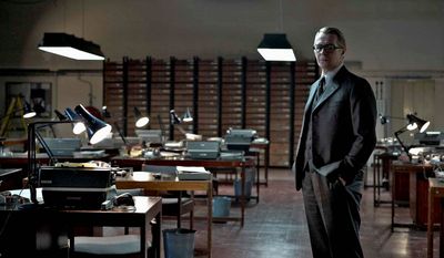 Gary Oldman (right) spent a month mulling over whether to take on the role of George Smiley, which Alec Guinness put a distinctive stamp on. &quot;The ghost of Guinness just sort of loomed so large,&quot; said Mr. Oldman, shown on the set (above) during the filming of &quot;Tinker, Tailor, Soldier, Spy.&quot; (Associated Press)