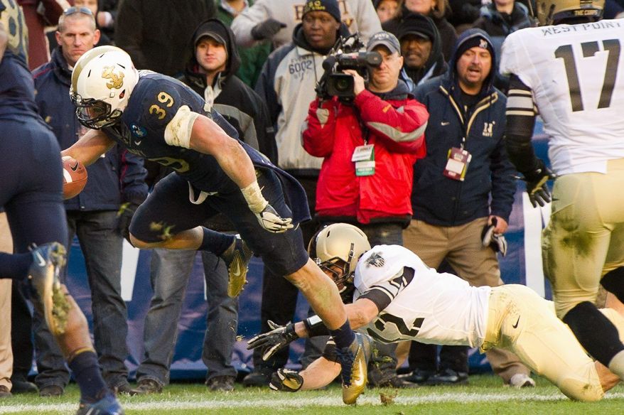 Fullback Alexander Teich's 10-yard touchdown run against Army was his biggest play in his last game for Navy. (Andrew Harnik / The Washington Times)