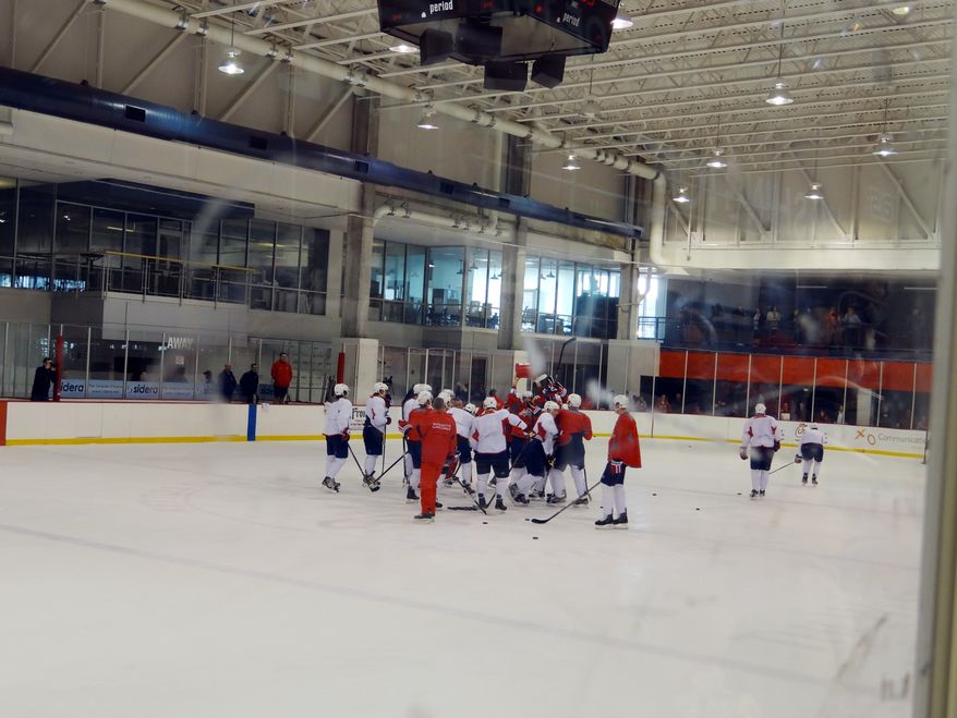 Troy Brouwer and the red team celebrate their scrimmage victory / Photo courtesy Joanne Pierce.