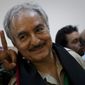 ** FILE ** Khalifa Hifter, then the Libyan senior rebel commander, leaves a press conference at the courthouse in the center of Benghazi, Libya, in March 2011. (AP Photo/Anja Niedringhaus, File) 
