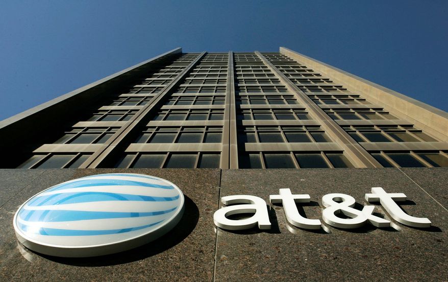 AT&T Inc. and the Justice Department agreed Dec. 12, 2011, to put off their upcoming antitrust trial over the phone company's proposed acquisition of smaller rival T-Mobile USA. (Associated Press)
