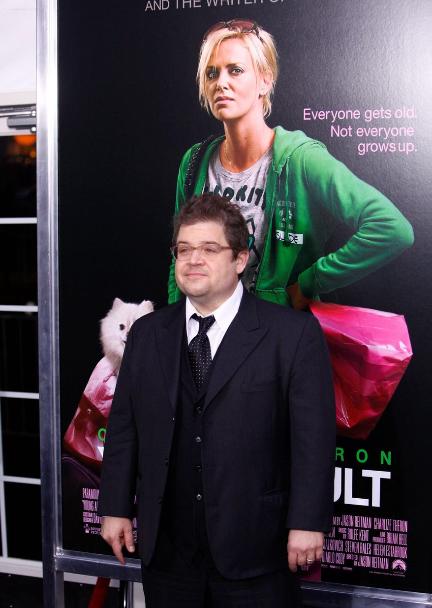 Patton Oswalt at Thursday's New York premiere of "Young Adult," in which he co-stars with Charlize Theron. He insists the love scene was a "nightmare." (Associated Press)