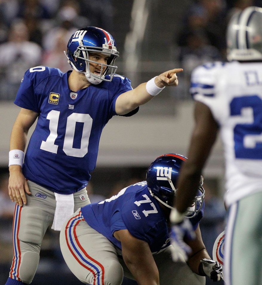 New York Giants quarterback Eli Manning threw for 400 yards and two touchdowns in Sunday night's omeback win over Dallas. (Associated Press)
