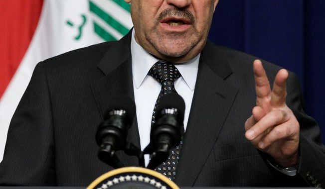 Iraqi Prime Minister Nouri al-Maliki makes a point at a joint news conference with President Obama on Monday at the White House. (Associated Press)