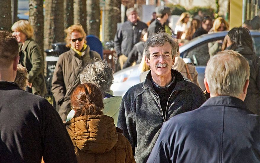 Maryland State Senator Brian E. Frosh (D-Montgomery County) takes time on a bustling Bethesda Avenue during the lunch hour in downtown Bethesda, Md, Friday, December 9, 2011. Montgomery County has become the power base for Democrats, as the region grows and Baltimore, the old power base shrinks. (Rod Lamkey Jr./The Washington Times)
