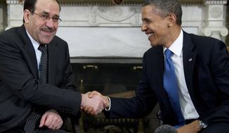 President Barack Obama meets with Iraq&#39;s Prime Minister Nouri al-Maliki in the Oval Office of the White House in Washington, Monday, Dec. 12, 2011. (AP Photo/Carolyn Kaster)