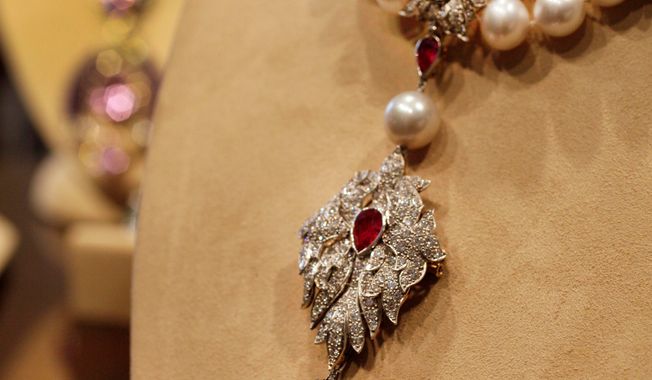 &quot;La Peregrina,&quot; an early 16th century pearl, ruby and diamond necklace. a gift from Richard Burton to Elizabeth Taylor in 1969, sold at an auction this week of Taylor&#x27;s jewelry for $18.8 million. (Associated Press)