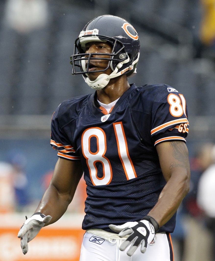 FILE - In this Aug. 13, 2011, file photo, Chicago Bears wide receiver Sam Hurd waits for a pass before an NFL preseason football game in Chicago. Hurd was in jail Thursday, Dec. 15, 2011, after authorities accused him of trying to set up a drug distribution network in the Chicago area and arrested him after he allegedly agreed to buy a kilogram of cocaine from an undercover agent. (AP Photo/Nam Y. Huh, File)