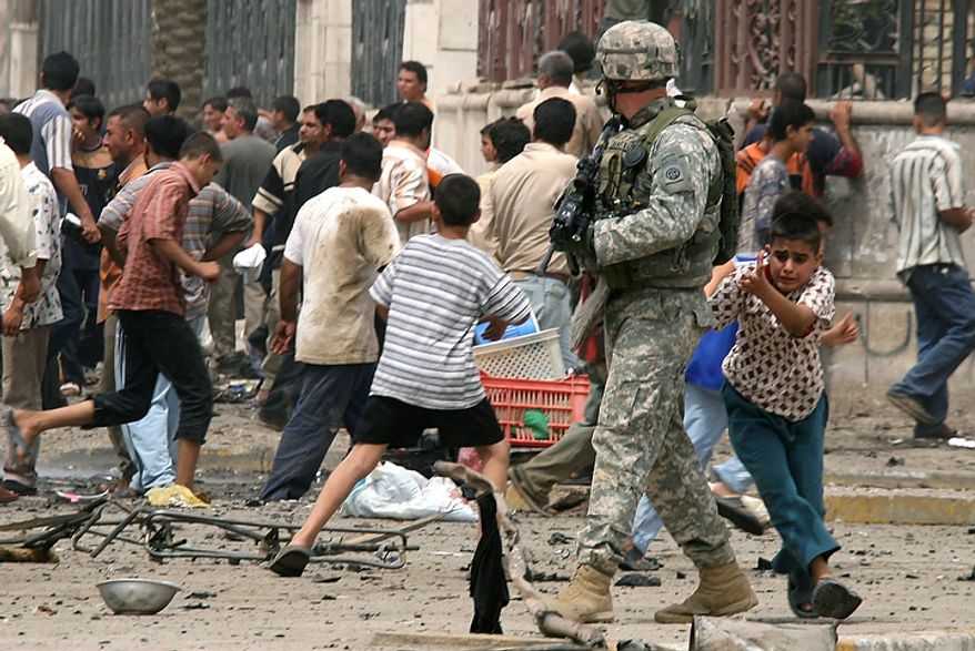 In this May 28, 2007 file photo, a young boy seeks shelter behind a soldier with the U.S. Army's 82nd Airborne division after gunshots rang out at the scene where just a few minutes earlier a suicide car bomber blew himself up in a busy commercial district in central Baghdad. killing at least 21 people and wounding 66. In the beginning, it all looked simple: topple Saddam Hussein, destroy his purported weapons of mass destruction and lay the foundation for a pro-Western government in the heart of the Arab world. Nearly 4,500 American and more than 100,000 Iraqi lives later, the objective now is simply to get out _ and leave behind a country where democracy has at least a chance, where Iran does not dominate and where conditions may not be good but "good enough." (AP Photo/Khalid Mohammed, File)