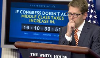 White House press secretary Jay Carney listens to a question during his daily news briefing at the White House on Dec. 15, 2011. (Associated Press)