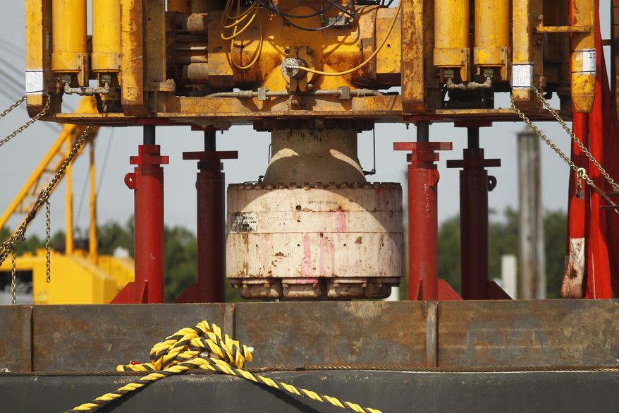 **FILE** The bottom of the blowout preventer stack, from the Deepwater Horizon explosion and oil spill, which is being examined as evidence for federal investigations, is seen Sept. 13, 2010, at the NASA Michaud Assembly facility in New Orleans. (Associated Press)