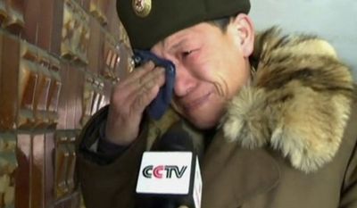 In this image made from television and provided by CCTV, China&#39;s state broadcaster, a North Korean man reacts to the death of North Korean leader Kim Jong-il in Pyongyang, North Korea, on Monday, Dec. 19, 2011. (AP Photo/CCTV) 