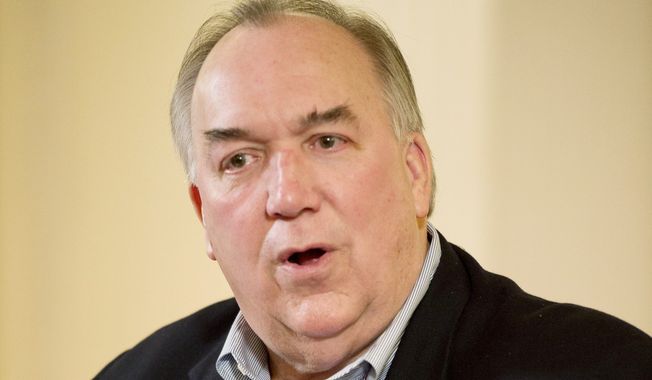 John Engler, president of the Business Roundtable, speaks with editors and reporters of The Washington Times in December. (Rod Lamkey Jr./The Washington Times) ** FILE **