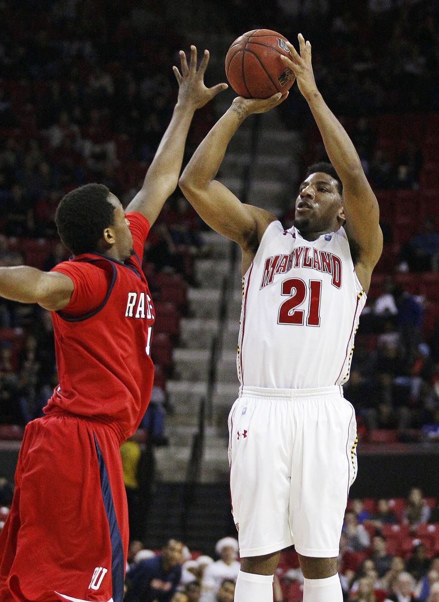 Maryland guard Pe'Shon Howard played first time since breaking his left foot in October. He was 3-for-6 from the field with seven points and three assists in Maryland's 65-60 win over Radford. (AP Photo/Patrick Semansky)