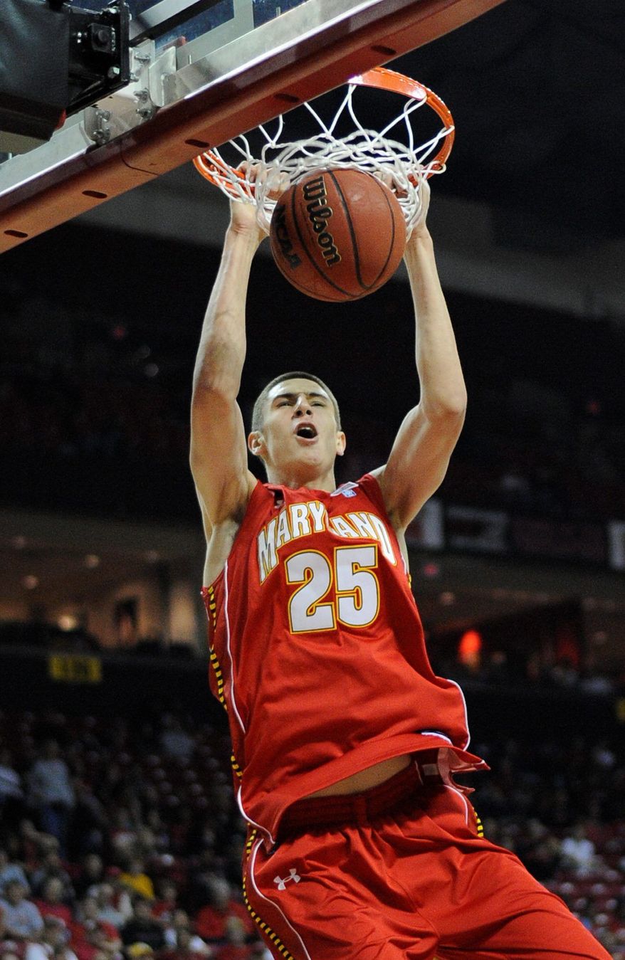 Maryland center Alex Len flashed his dunking form during Midnight Madness festivities in October. Ruled ineligible for the first 10 games, Len will make his debut Wednesday against Albany. (Associated Press)