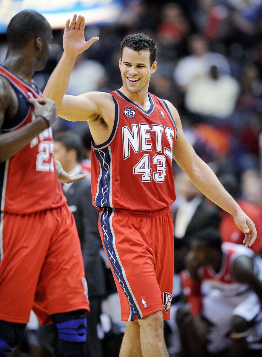New Jersey forward Kris Humphries answered Wizards fans' boos with 21 points and 16 rebounds. (Associated Press)