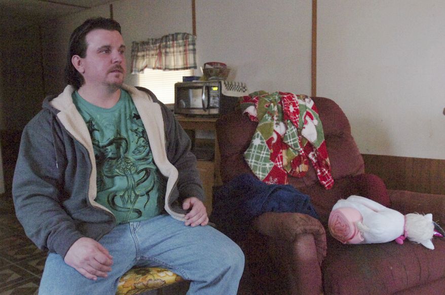 Michael Plumadore is pictured on Sunday, Dec. 25, 2011, two days after Aliahna Maroney-Lemmon, 9, went missing in Fort Wayne, Ind. (AP Photo/The Journal-Gazette, Cathie Rowand)