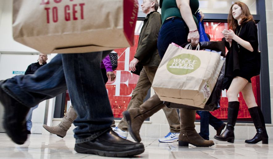 Shoppers crowd Tysons Corner Center in McLean on Monday, Dec. 26, 2011, for returns and after-Christmas sales. (The Washington Times)