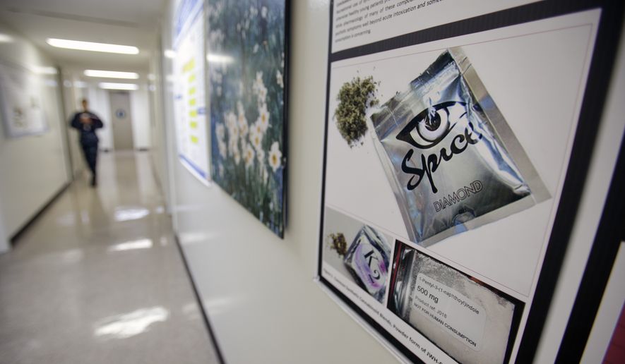 A poster warning of the effects of the drug known as &#x27;Spice&#x27; hangs on a wall Dec. 6, 2011, at the Naval Hospital in San Diego. (Associated Press) **FILE**