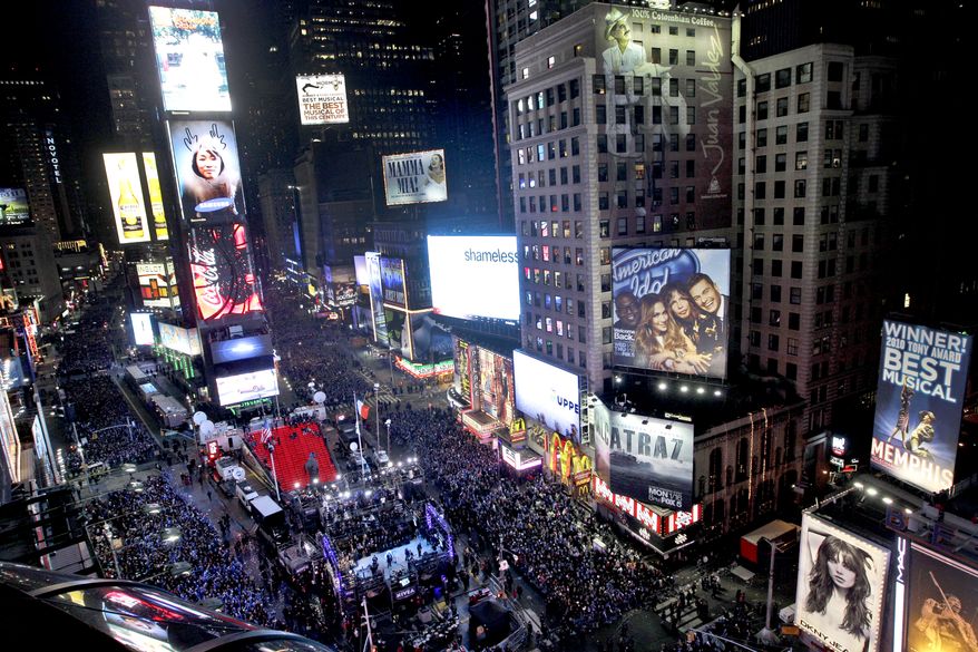 The crowd packs New York's Times Square during the New Year's Eve celebration as seen from the Marriott Marquis hotel, Saturday, Dec. 31, 2011, in New York. (AP Photo/Mary Altaffer)