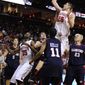 Maryland&#39;s Alex Len shoots over the Samford defense in the second half, Saturday, Dec. 31, 2011, in College Park, Md. Maryland won 75-63, and Len had 13 points and seven rebounds. (AP Photo/Gail Burton)