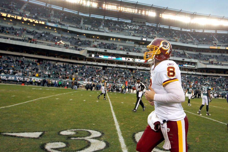 Washington Redskins' quarterback Rex Grossman threw an interception in the 34-10 loss to the Philadelphia Eagles on Sunday. His 25 interceptions for the season led the league. Sunday's loss gave the team a 5-11 record.