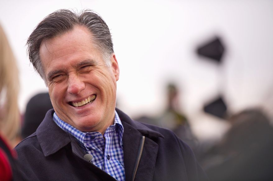 FRONT-RUNNER: Republican presidential hopeful Mitt Romney took the lead in the final pre-caucus Des Moines Register poll, garnering 24 percent of the vote. "I can't tell you who's going to win this thing, but I do believe I'm going to have a great deal of support," Mr. Romney said. (Andrew Harnik/The Washington Times)