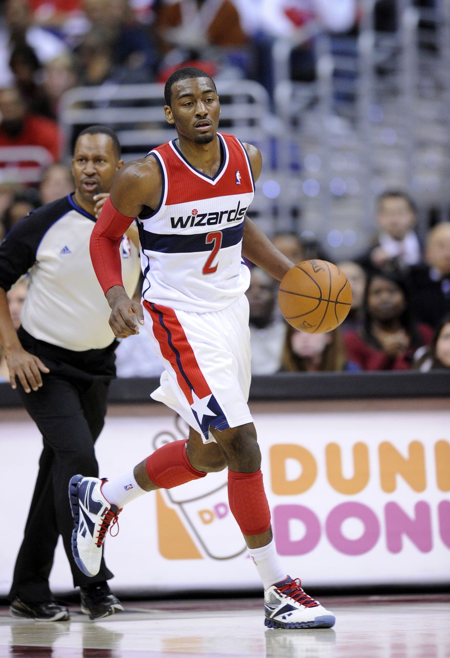 Washington Wizards guard John Wall is averaging 13 points, six assists and just under four rebounds this season. (AP Photo/Nick Wass)