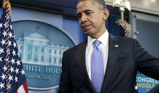 **FILE** President Obama leaves a news conference at the White House on Dec. 8, 2011. (Associated Press)