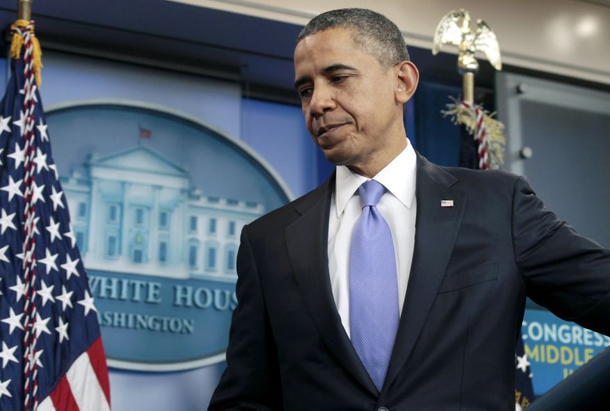 **FILE** President Obama leaves a news conference at the White House on Dec. 8, 2011. (Associated Press)