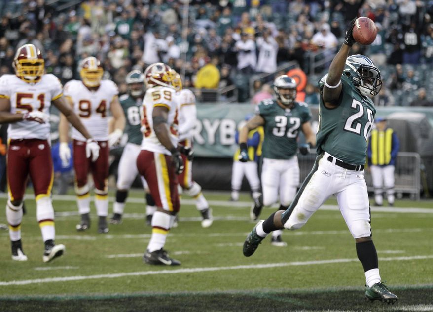 Philadelphia Eagles' Dion Lewis celebrates after scoring a touchdown during the second half of an NFL football game against the Washington Redskins, Sunday, Jan. 1, 2012, in Philadelphia. Philadelphia won 34-10. (AP Photo/Matt Slocum)