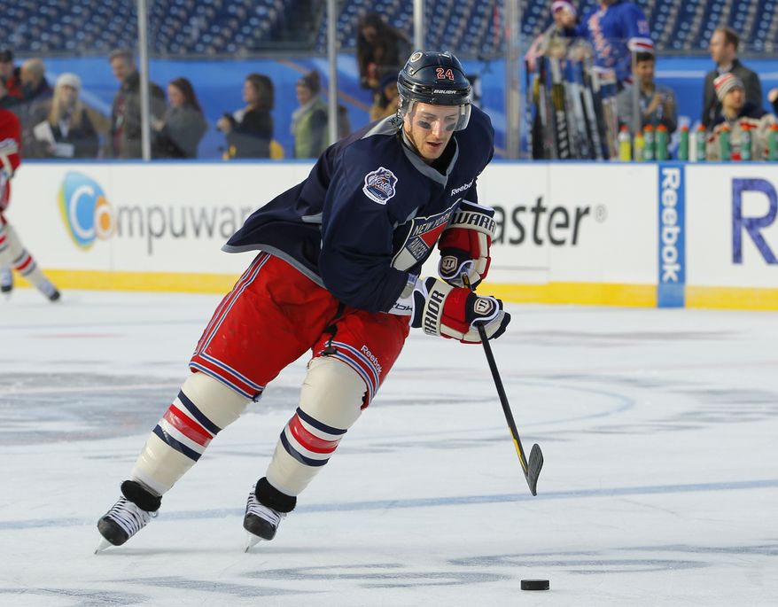 New York Rangers captain Ryan Callahan has 13 goals and 28 points this season. The Rangers are slated to play the Philadelphia Flyers in the Winter Classic on Monday, Jan. 2, 2012. (AP Photo/Tom Mihalek)