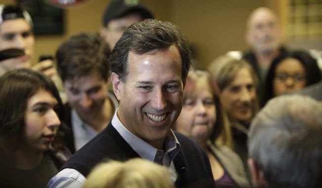 Republican presidential candidate and former Pennsylvania Sen. Rick Santorum speaks Jan. 1, 2012, to local residents during a campaign stop at the Daily Grind coffee shop in Sioux City, Iowa. (Associated Press)