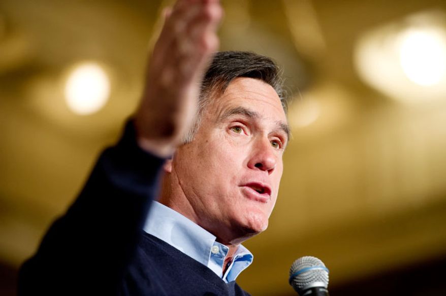 Republican presidential candidate Mitt Romney holds an early morning rally at the Temple for Performing Arts on the day of the Iowa caucus, Des Moines, IA, Tuesday, January 3, 2012. (Andrew Harnik / The Washington Times)